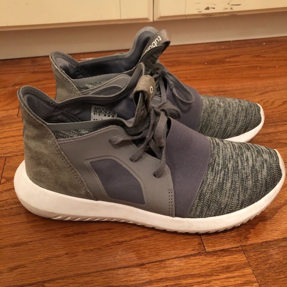 Gray Adidas Tubular running shoes